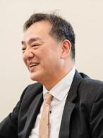 ニッケグループ 代表日本毛織株式会社 取締役社長 富田一弥